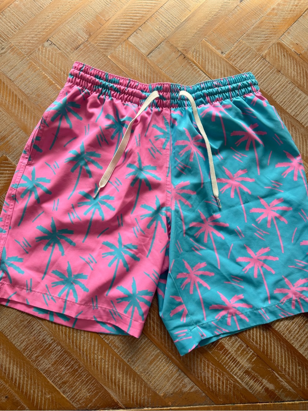 Chubbies Pink and Teal Palm Print Swim Trunks, 7” inseam